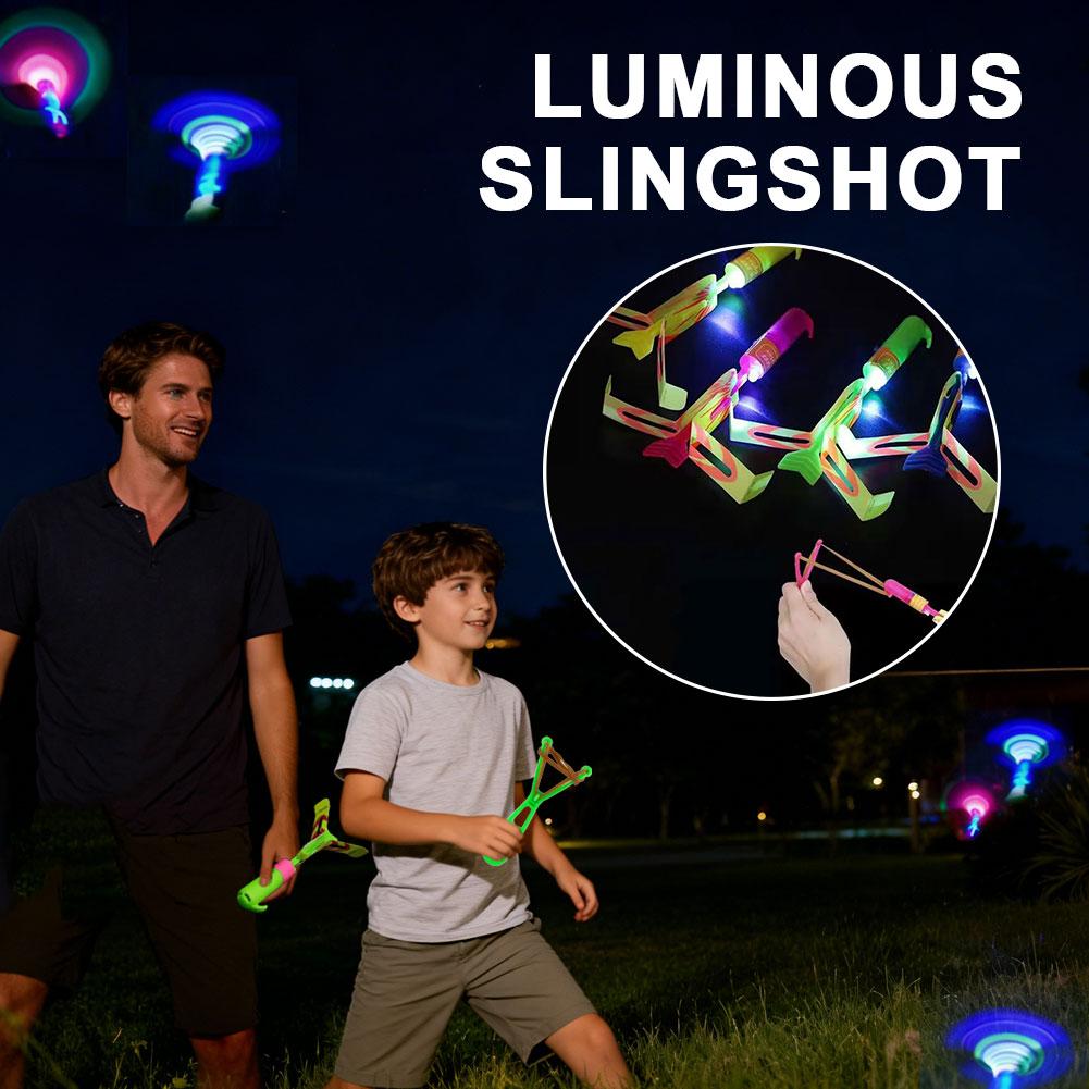 Outdoor Hunting Products - ของเล่นเฮลิคอปเตอร์บินได้พร้อมไฟ LED แบบยิงด้วยหนังสติ๊ก มีเสียงหวีด เรืองแสงในที่มืด ของขวัญสนุกๆ